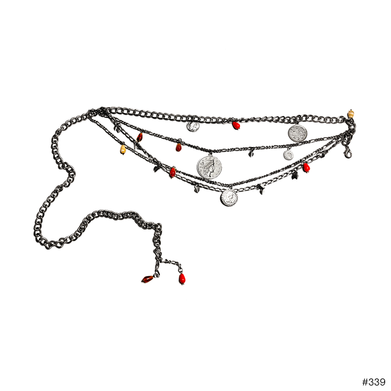 Layered silver chain necklace with coin charms and red and beige bead accents