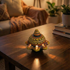 Decorative turtle lamp on a wooden table with a cozy living room background