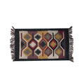 Decorative rug with geometric pattern and fringes on a white background