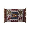 Decorative rug with geometric pattern and fringes on a white background