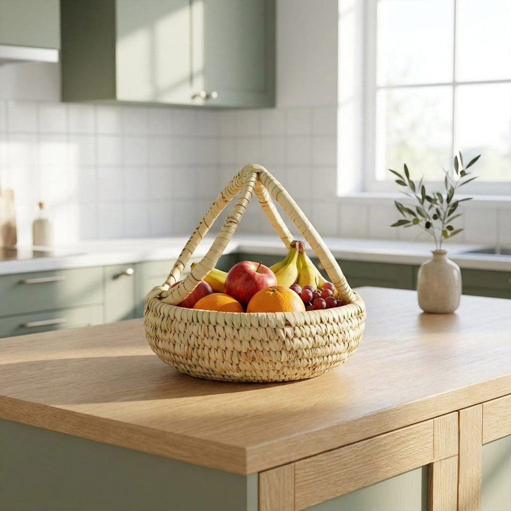 Woven fruit basket with fruits on a kitchen counter