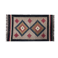 Woven rug with geometric pattern on a plain background