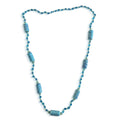 Blue beaded necklace on a white background