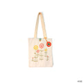Cream canvas tote bag with embroidered colorful floral design and long beige straps