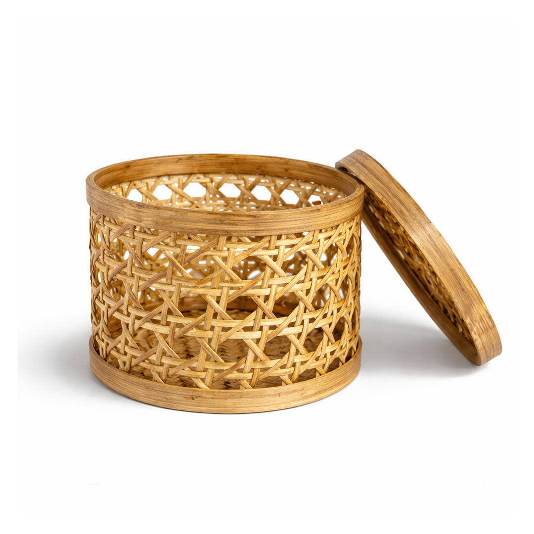 Bamboo basket with a lid on a white background