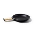 Black frying pan with a textured handle on a white background