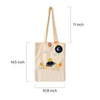 Beige canvas tote bag with embroidered girl and flowers, measuring 14.5x10.8 inches with 11-inch straps