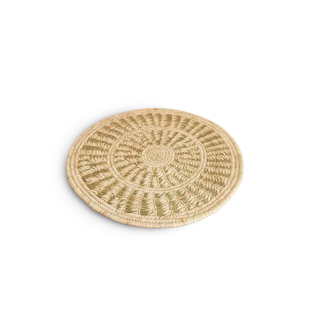 Round woven placemat on a white background