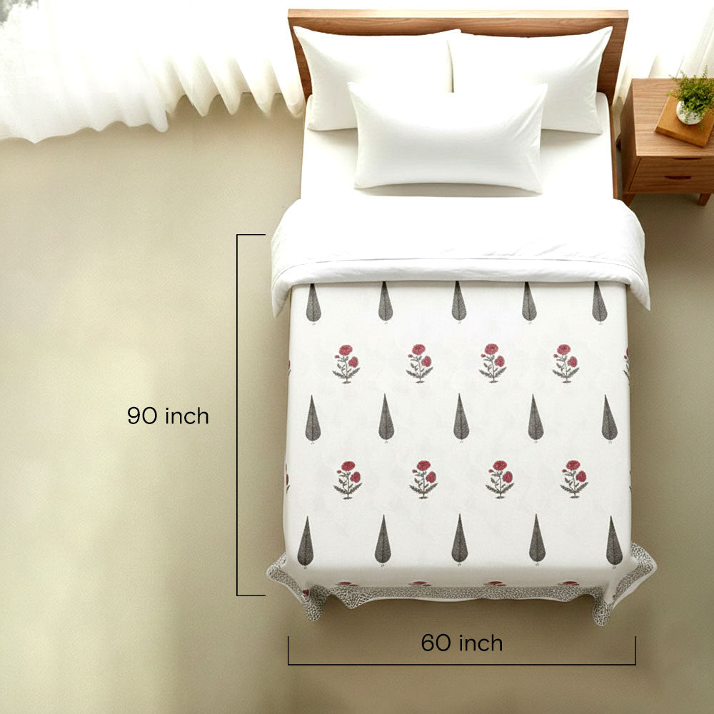 Bedding set with floral pattern and measurements on a bed