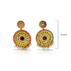 Colorful earrings with intricate designs on a white background