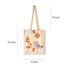 Beige canvas tote bag with embroidered pink bird and brown leaves, 11x13 inches, long handles