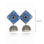 Pair of blue and silver earrings with a measurement label on a white background