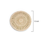 Round woven mat with a measurement label indicating 12 inches on a white background