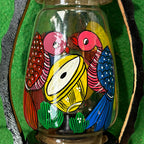 Melody in Glass: Handcrafted Pattachitra Bird & Musical Motif Lantern - Madhues