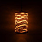 Woven lampshade with a geometric pattern on a dark background