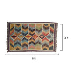 Multicolored geometric patterned rug with dimensions 6 ft by 4 ft on a white background