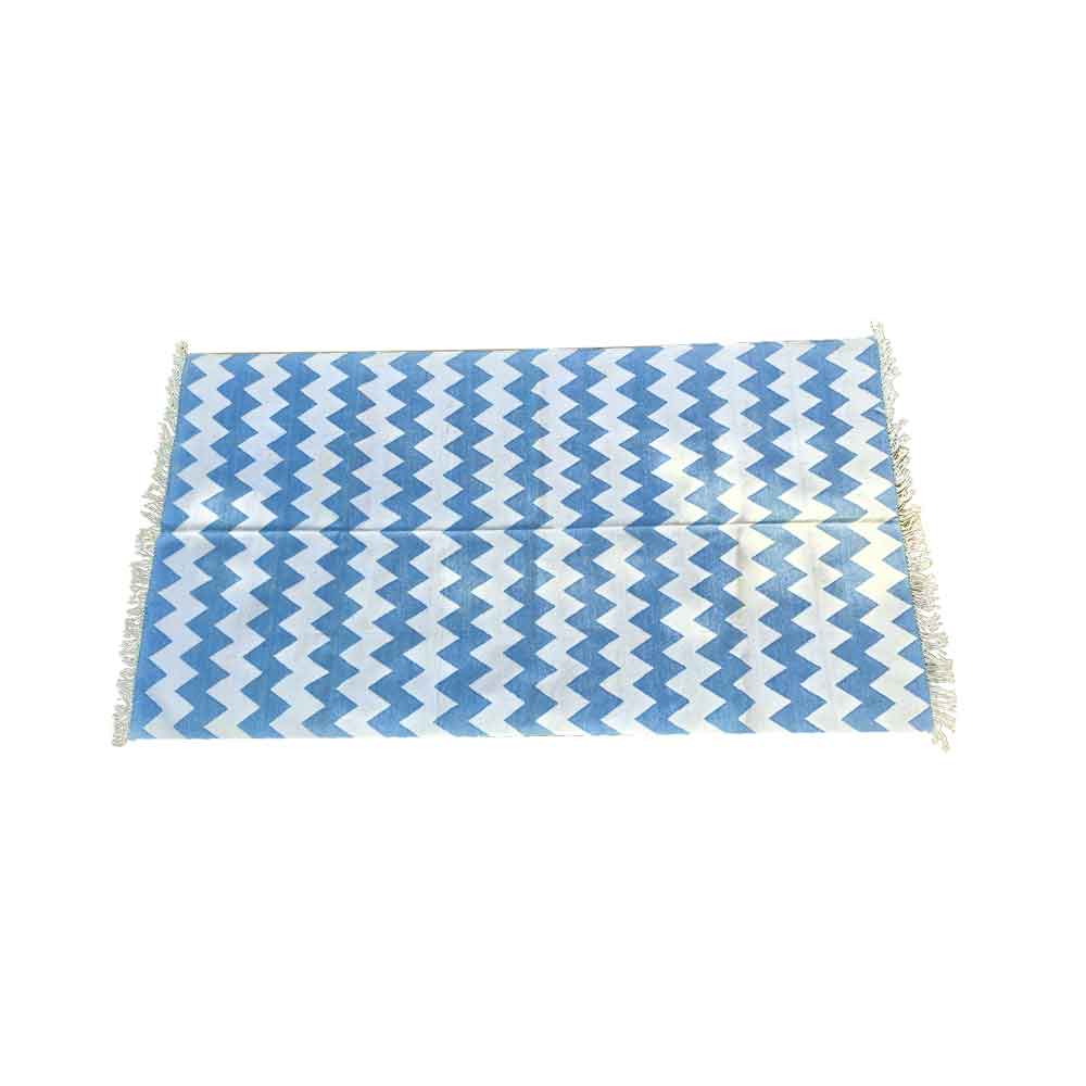 The Sky Blue Chevron Beach Rug - Image 1