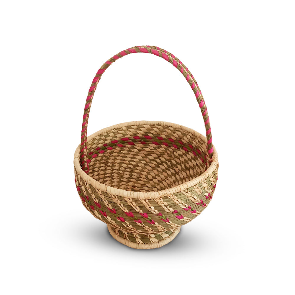 Woven basket with a handle on a white background