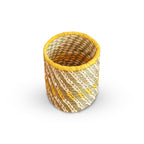 Woven basket with yellow rim on a white background