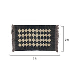 Black and beige checkered rug 