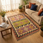 patterned rug, sofa, and decor items.