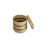 Woven basket with a lid on a white background