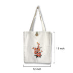 Tote bag with floral design and measurements on a white background