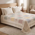 Angled view showing texture and fabric quality of the handmade applique bedspread
