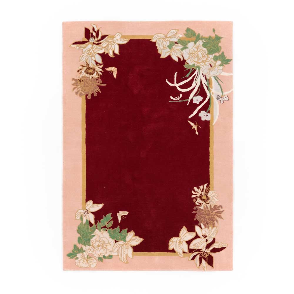 Artisan hand-tufted New Zealand wool area rug with maroon center and floral blush border
