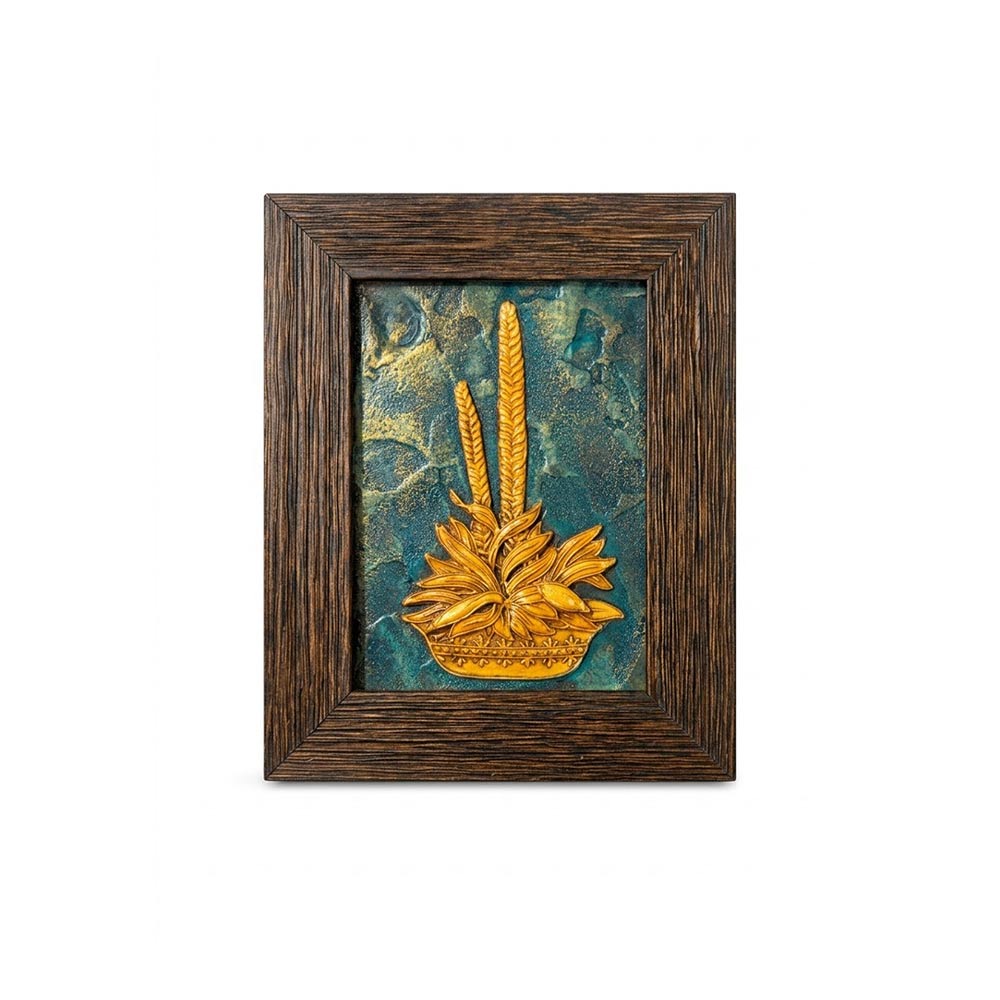 Front view of an artisan stone painting featuring a golden floral relief on a teal textured background in a dark wooden frame.
