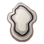 Aurora Rugs hand-tufted New Zealand wool abstract organic area rug in neutral tones, top-down view