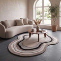 Close-up perspective of the multi-toned border and craftsmanship on Aurora Rugs piece