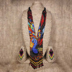 Detailed view of handmade beaded triangular earrings