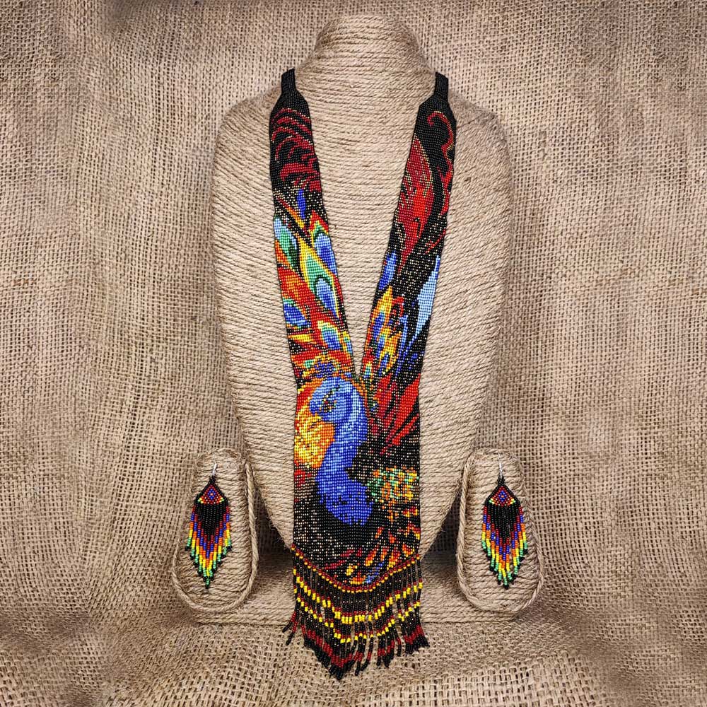 Detailed view of handmade beaded triangular earrings