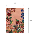Close-up detail of hand-tufted floral patterns and bird motifs on luxury New Zealand wool rug