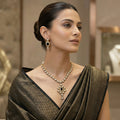 Elegant Oval Kundan Necklace Set with Black Stone Accents