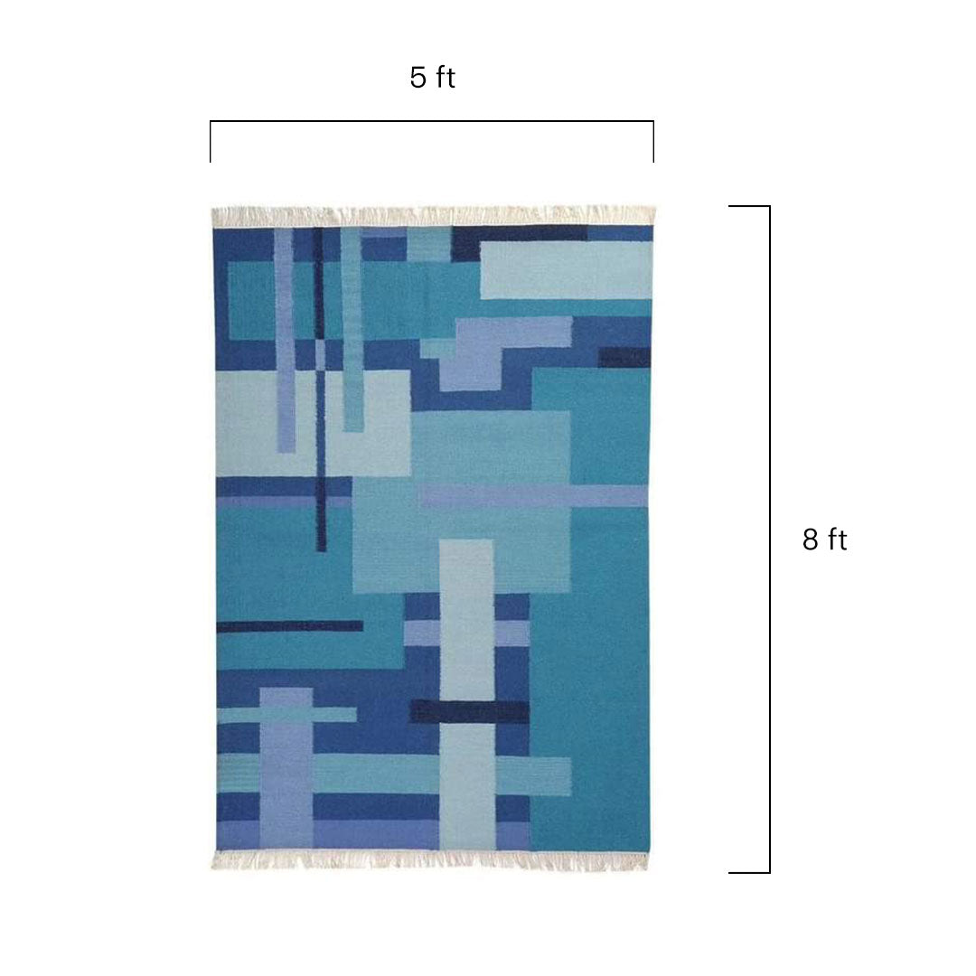 Blue geometric patterned rug with dimensions labeled on a white background