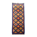 Woven rug with geometric pattern on a white background