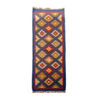 Woven rug with geometric pattern on a white background