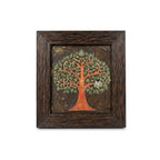 Handcrafted Bodhi tree stone relief painting with intricate green leaves and orange trunk in a rustic dark wood frame, front view.
