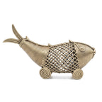 Decorative fish-shaped object made of woven material on a white background