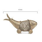 Decorative fish-shaped object with measurements on a white background