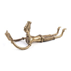 Bronze weapon with a figure on top on a white background