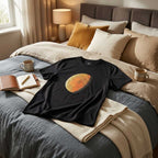 Rear view of the black hand-painted celestial T-shirt showing fit and fabric texture.