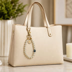 Pearl and Daisy Evil Eye Bag Charm with Gold Accents