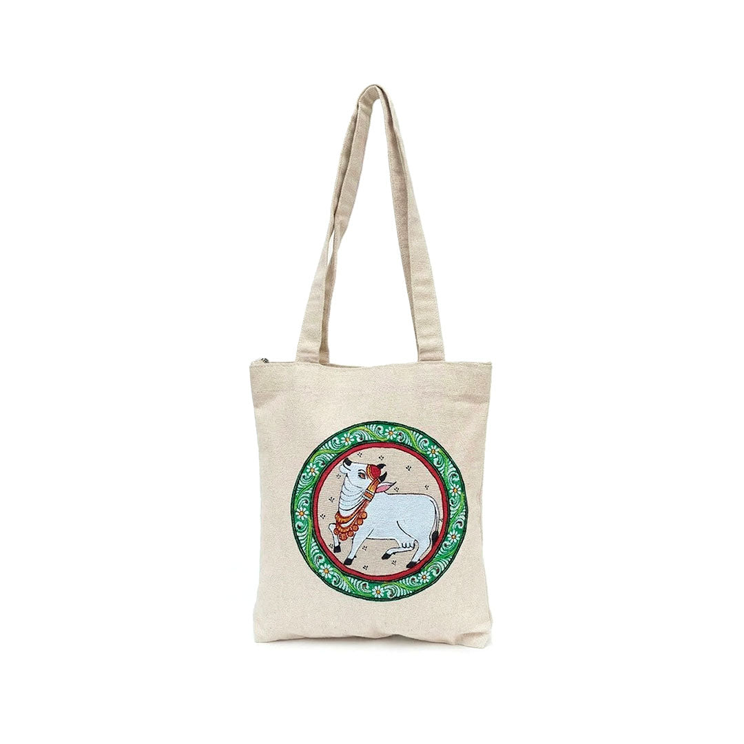 Beige tote bag with a circular design featuring a horse on a white background