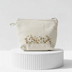 Gota Patti-Embroidered Cream Travel Pouch - Gold Vine Pattern