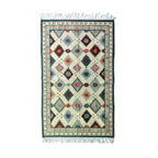 cream geometric tribal rug