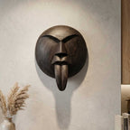 Hand-Carved Gamari Wood Mask with Bold Extended Tongue