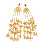 Front view of DI gold plated traditional jhumka earrings with green stone and hanging bell charms